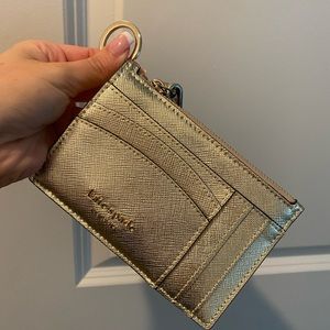 Metallic gold KATE SPADE I.d holder/ wristlet. 👜✨